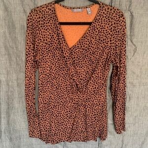 Lisa Rinna top with long sleeves and crossbody closure